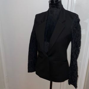 Beautiful, luxury, chic black blazer. Perfect for night events or work!